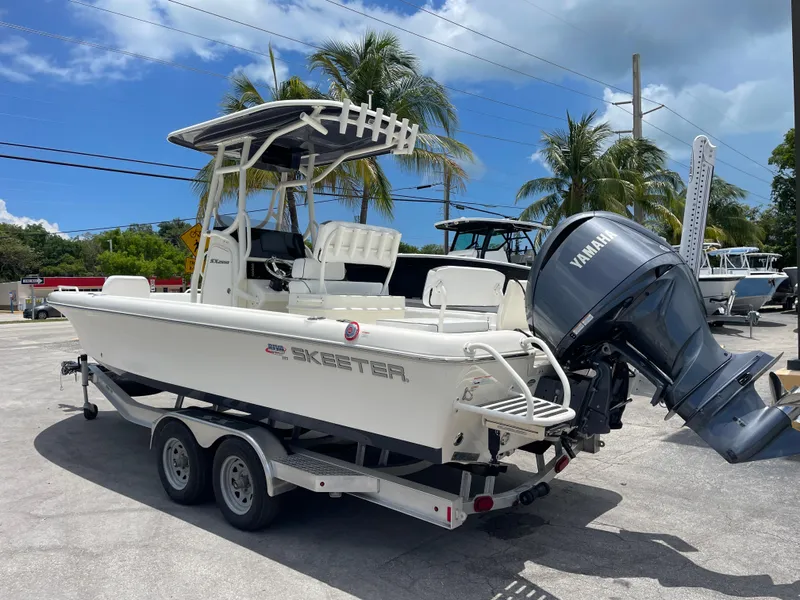Slide: The Image of 2022 Skeeter 2550 Family boat with Yamaha outboard motor on trailer. - 6