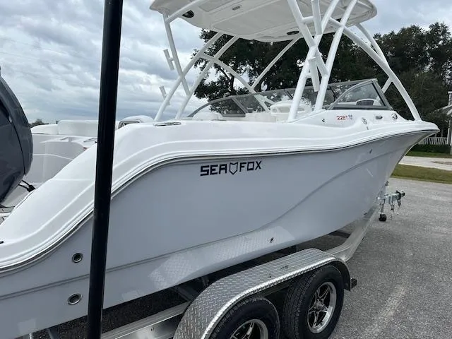 Slide: The Image of 2024 Sea Fox 228 Traveler boat on a trailer, side view. - 2