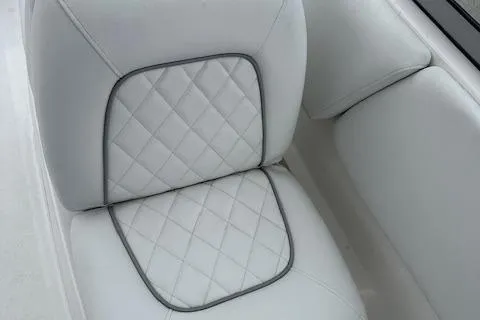 Slide: The Image of 2024 Sea Fox 228 Traveler boat seat with diamond-stitched upholstery. - 9