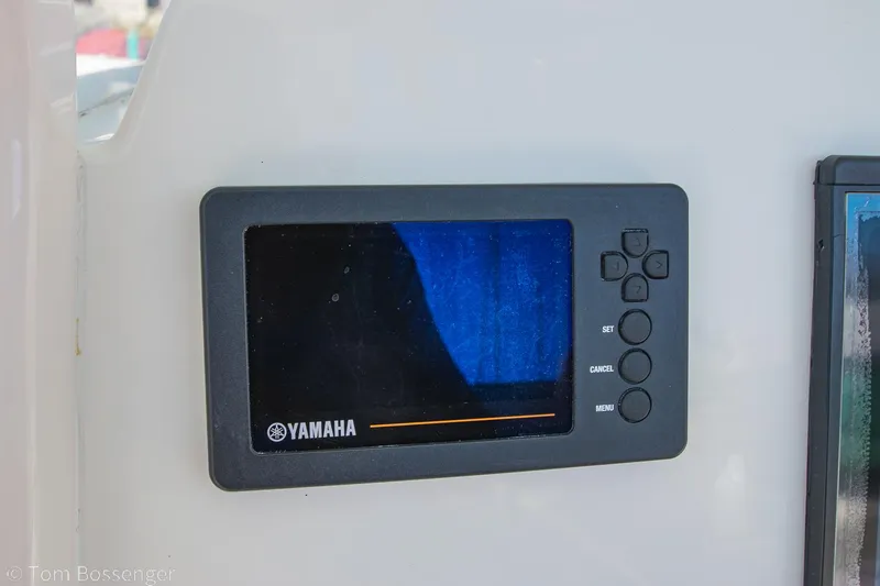 Slide: The Image of Yamaha display panel on 2018 Cobia 240 CC boat dashboard. - 16