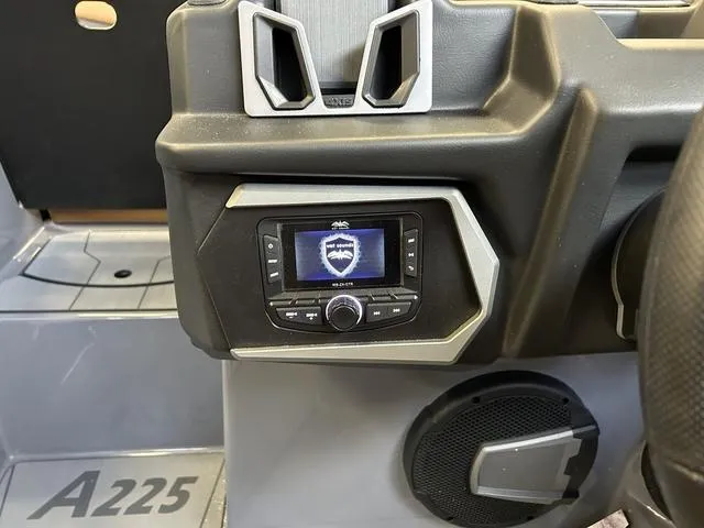 Slide: The Image of 2024 Axis Wake Research A225 dashboard with control panel and speaker. - 8