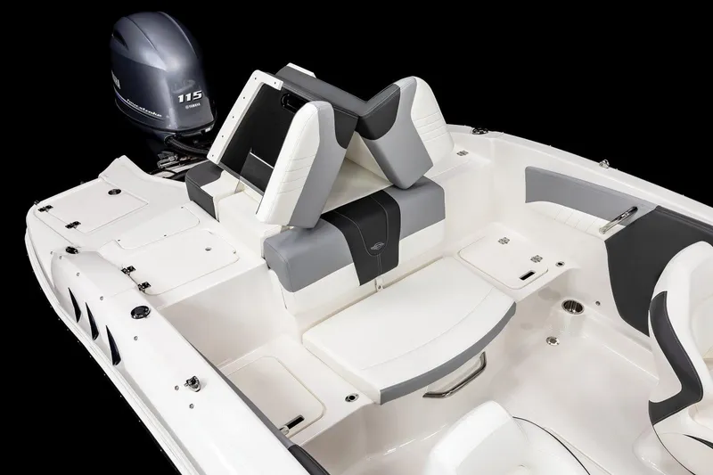 Slide: The Image of 2024 Chaparral 19 SSi OB boat interior with modern seating and dashboard. - 18