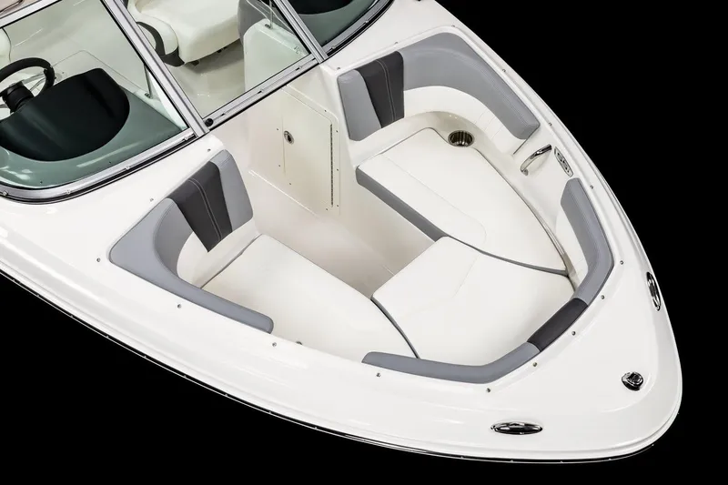 Slide: The Image of 2024 Chaparral 19 SSi OB boat interior with white captain's chair and modern design. - 6