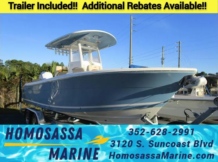 Slide: The Image of 2024 Cobia 240 CC boat with trailer at Homosassa Marine, additional rebates available. - 1