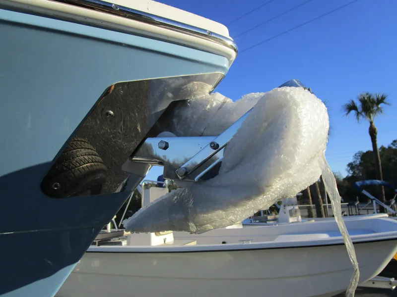 Slide: The Image of 2024 Cobia 240 CC boat anchor wrapped in protective material. - 4