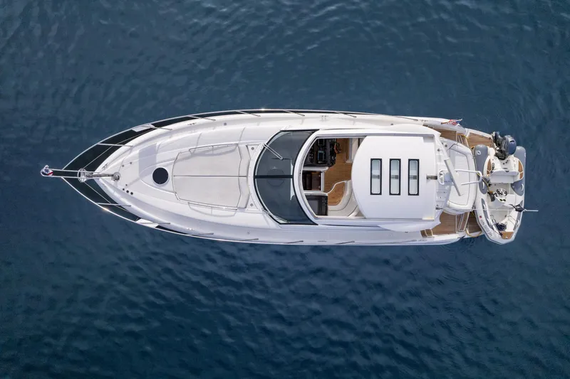 Slide: The Image of Aerial view of a 2007 Sunseeker Portofino 47 yacht on the water. - 13