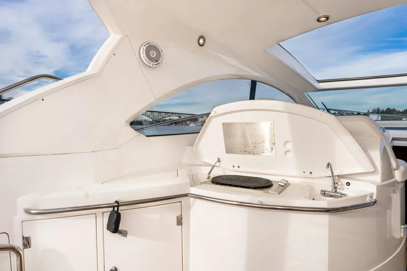 Slide: The Image of 2007 Sunseeker Portofino 47 yacht interior with sleek white cabinetry and modern design. - 26