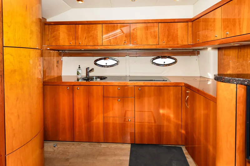 Slide: The Image of Luxurious wooden kitchen interior of 2007 Sunseeker Portofino 47 yacht. - 30