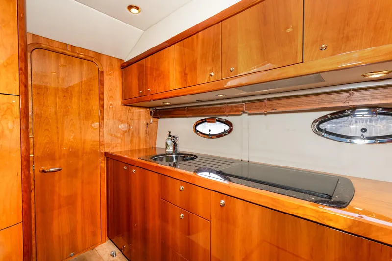 Slide: The Image of Luxurious wooden kitchen interior of 2007 Sunseeker Portofino 47 yacht. - 31