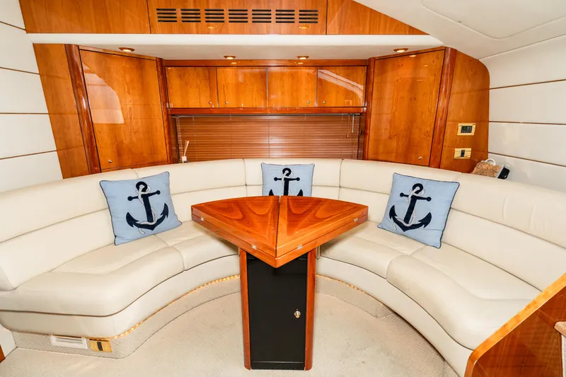 Slide: The Image of Luxurious interior of 2007 Sunseeker Portofino 47 yacht with leather seating and nautical decor. - 36