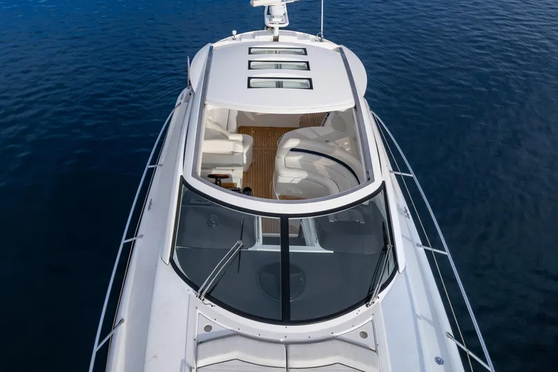 Slide: The Image of 2007 Sunseeker Portofino 47 yacht with spacious deck and sleek design. - 6