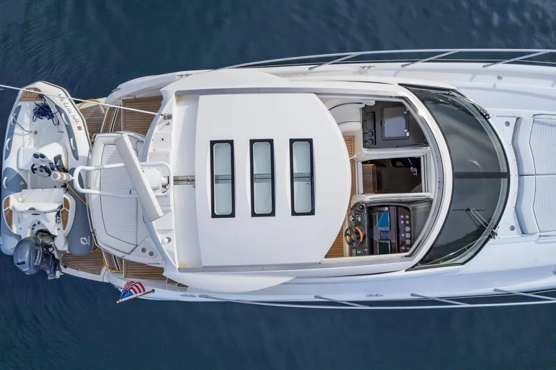 Slide: The Image of Top view of a 2007 Sunseeker Portofino 47 yacht on the water. - 7