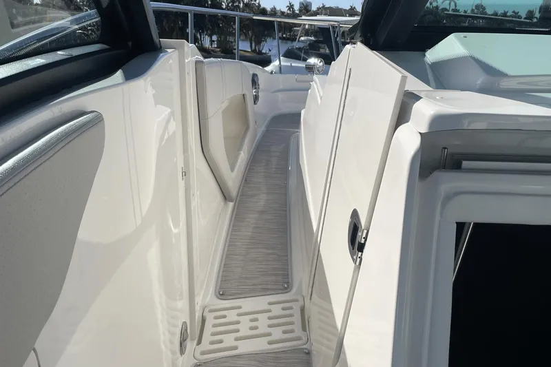 Slide: The Image of 2024 Sea Ray Sundancer 320 Outboard deck, featuring sleek design and modern amenities. - 23