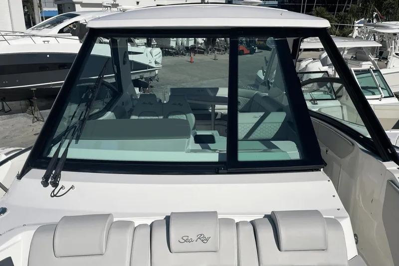 Slide: The Image of 2024 Sea Ray Sundancer 320 Outboard boat with sleek design and spacious interior. - 26