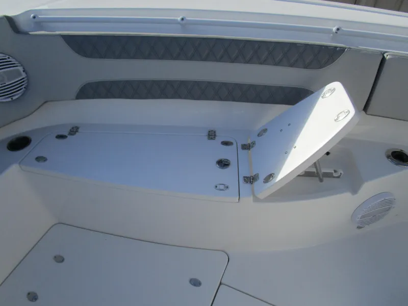 Slide: The Image of 2024 Sea Pro 322 Offshore boat interior with storage compartment open. - 34