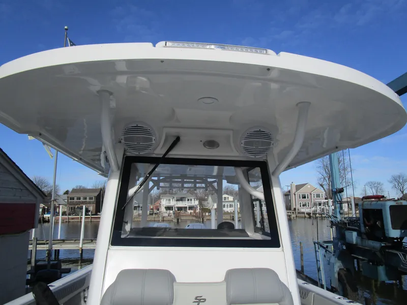 Slide: The Image of 2024 Sea Pro 322 Offshore boat with hardtop and waterfront view. - 35