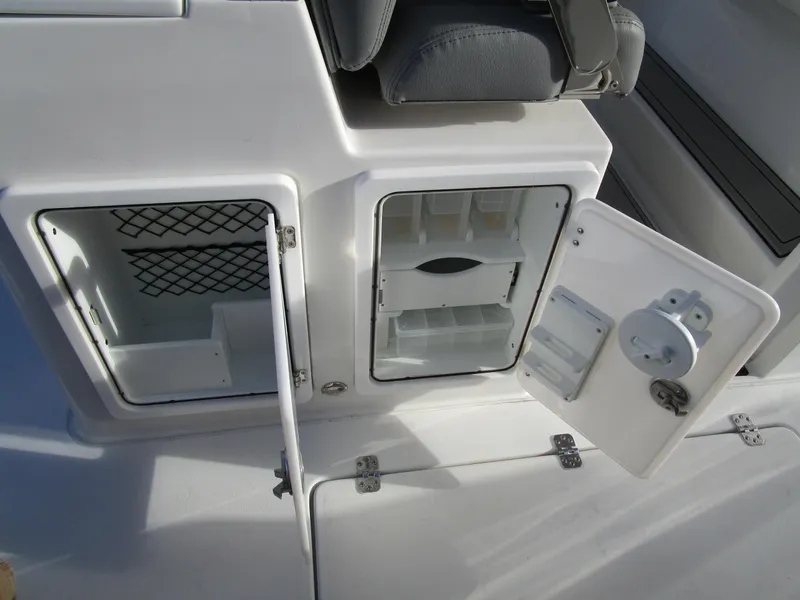 Slide: The Image of 2024 Sea Pro 322 Offshore storage compartments and seating area. - 37