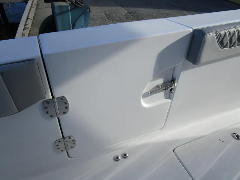 Slide: The Image of 2024 Sea Pro 322 Offshore boat interior detail with door and hinges. - 39
