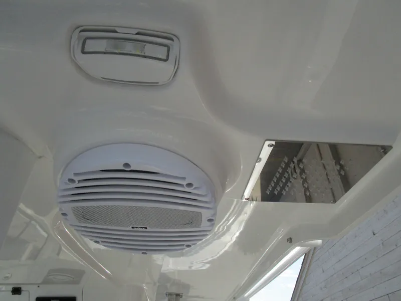 Slide: The Image of 2024 Sea Pro 322 Offshore boat interior ceiling with speaker and light. - 40