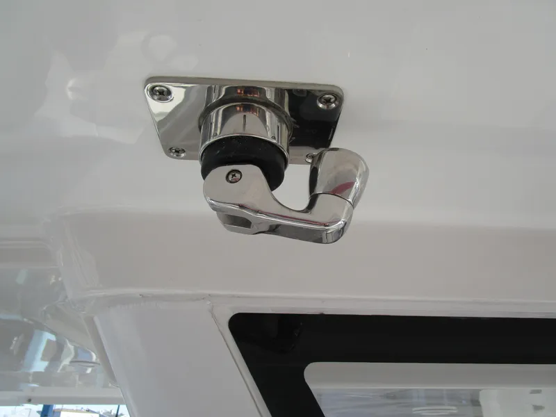 Slide: The Image of Close-up of a latch on a 2024 Sea Pro 322 Offshore boat. - 43