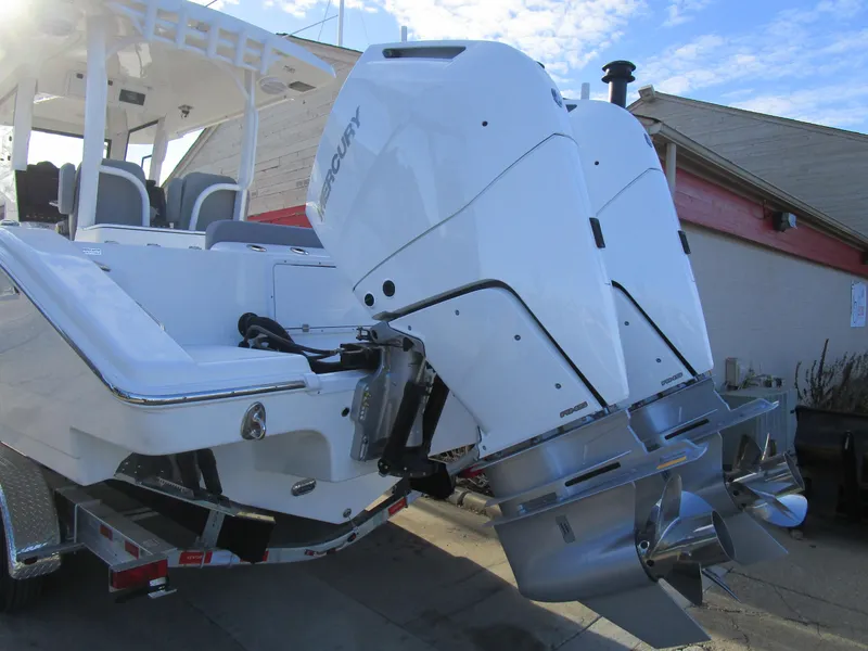 Slide: The Image of 2024 Sea Pro 322 Offshore boat with dual Mercury outboard engines. - 7