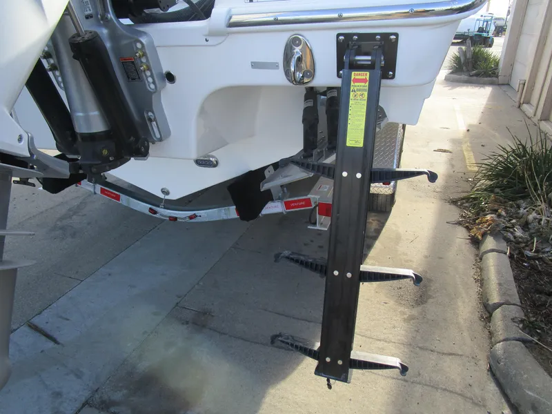 Slide: The Image of 2024 Sea Pro 322 Offshore boat with a mounted ladder. - 8