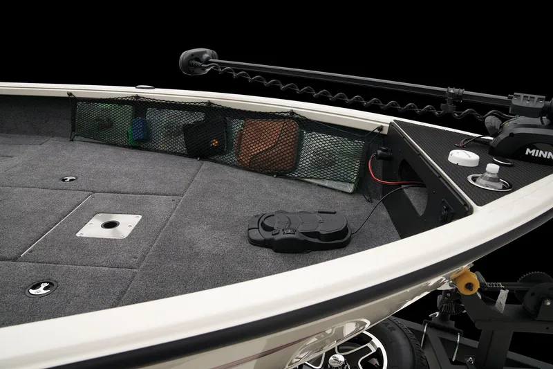 Slide: The Image of 2024 Ranger VS1882SC Angler boat deck with storage compartments and trolling motor. - 10
