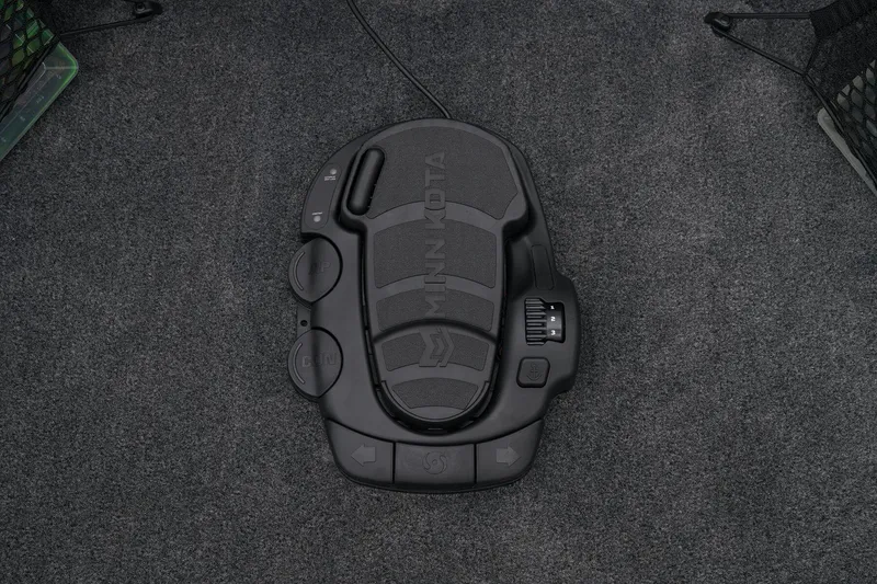 Slide: The Image of 2024 Ranger VS1882SC Angler boat foot pedal control on carpeted floor. - 16