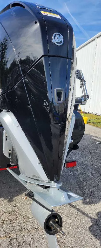 Slide: The Image of 2024 Regency 250 LE3 Sport boat engine close-up. - 3
