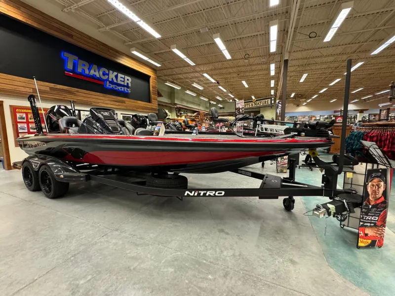 Slide: The Image of 2024 Nitro Z21 XL boat displayed at Tracker Boats showroom. - 1