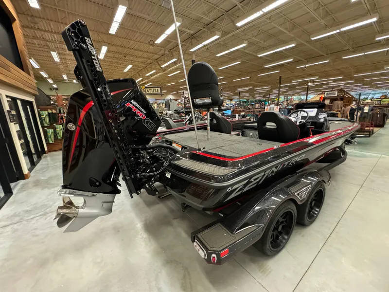 Slide: The Image of 2024 Nitro Z21 XL boat displayed indoors, featuring sleek design and powerful engine. - 3