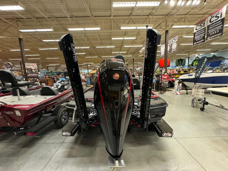 Slide: The Image of 2024 Nitro Z21 XL boat displayed in a showroom with other boats. - 6