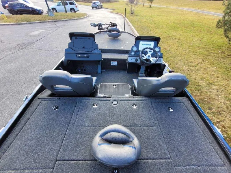Slide: The Image of 2024 Nitro Z20 Pro fishing boat interior with dual consoles and seating. - 5
