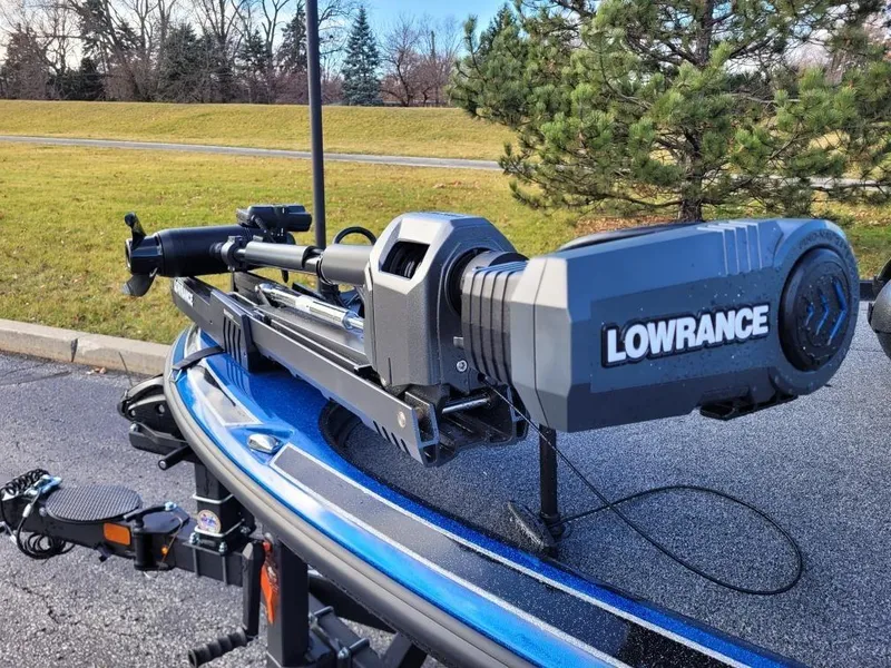 Slide: The Image of 2024 Nitro Z20 Pro boat with Lowrance trolling motor in a parking lot. - 6