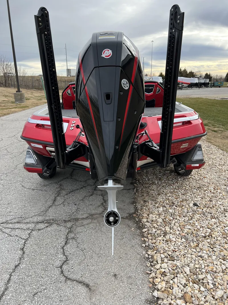 Slide: The Image of 2024 Ranger Z521R bass boat rear view with outboard motor. - 6