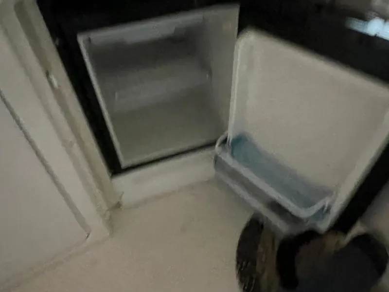 Slide: The Image of Open refrigerator inside a 1999 Sea Ray 380 Sundancer yacht. - 9
