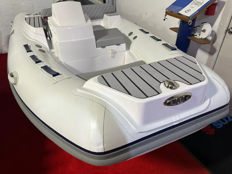 Slide: The Image of 2024 Tiger Marine PT 370 inflatable boat on display indoors. - 6