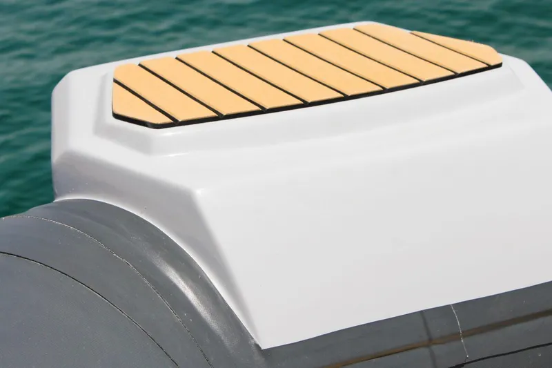 Slide: The Image of Tiger Marine SL 480 2024 boat deck detail with wooden finish. - 8