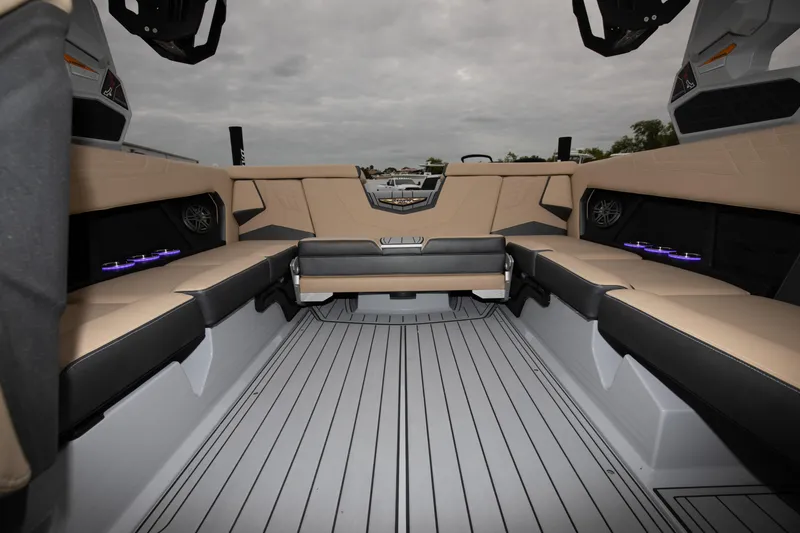 Slide: The Image of 2024 Nautique Super Air Nautique S23 interior with luxurious seating and modern design. - 19