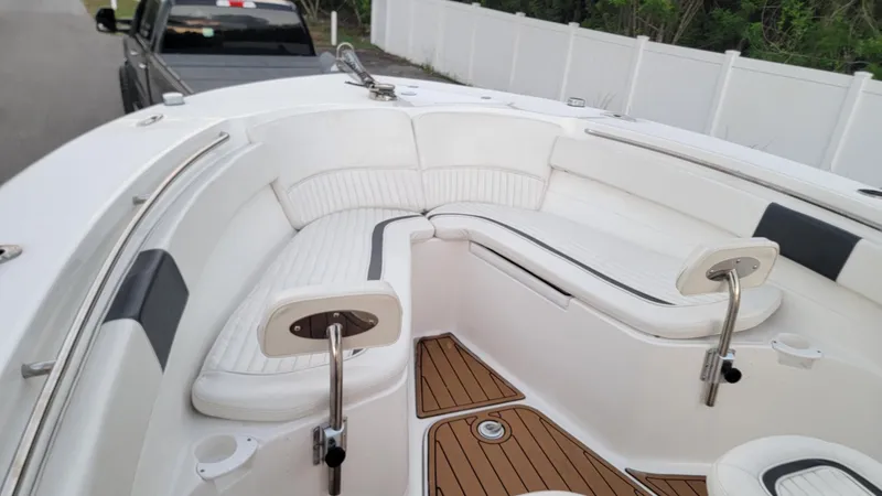 Slide: The Image of Luxurious seating on 2010 Sea Fox 286 Commander boat with teak flooring. - 6