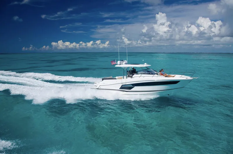 Slide: The Image of 2021 Jeanneau Leader 12.5 cruising on clear turquoise waters. - 3