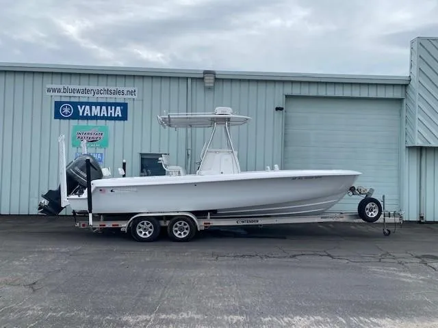 Slide: The Image of 2015 Contender 24 Sport boat on trailer outside Bluewater Yacht Sales. - 0