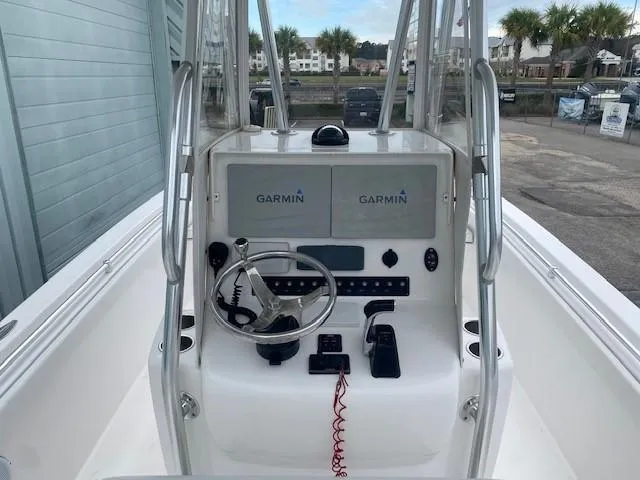 Slide: The Image of 2015 Contender 24 Sport boat console with Garmin navigation system. - 3