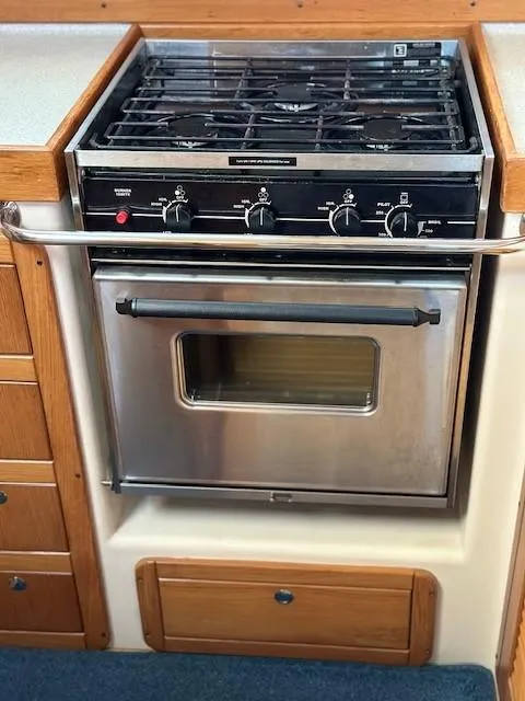Slide: The Image of Stainless steel oven and stove in 2009 Catalina 470 yacht kitchen. - 25