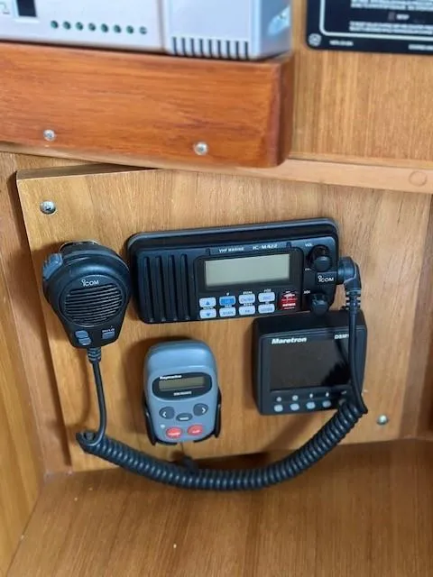 Slide: The Image of Boat communication equipment on a 2009 Catalina 470, featuring radio and control devices. - 31