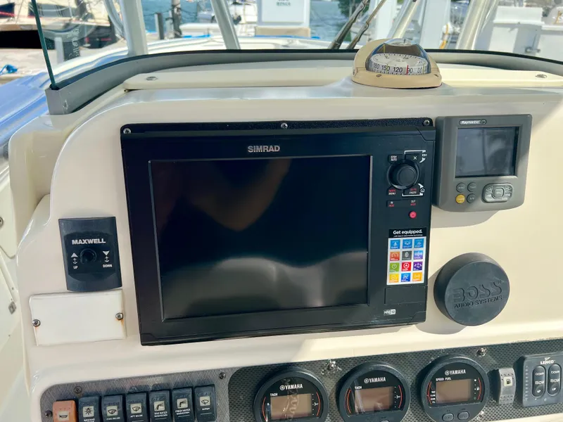 Slide: The Image of 2008 Hydra-Sports Vector 2900 CC dashboard with navigation and control systems. - 21