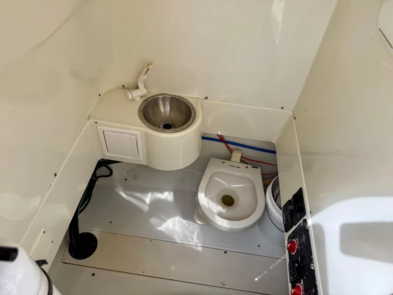 Slide: The Image of 2008 Hydra-Sports Vector 2900 CC boat interior with sink and toilet. - 28