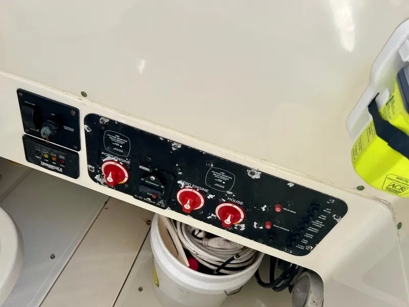 Slide: The Image of Control panel of a 2008 Hydra-Sports Vector 2900 CC boat with switches and wiring. - 29