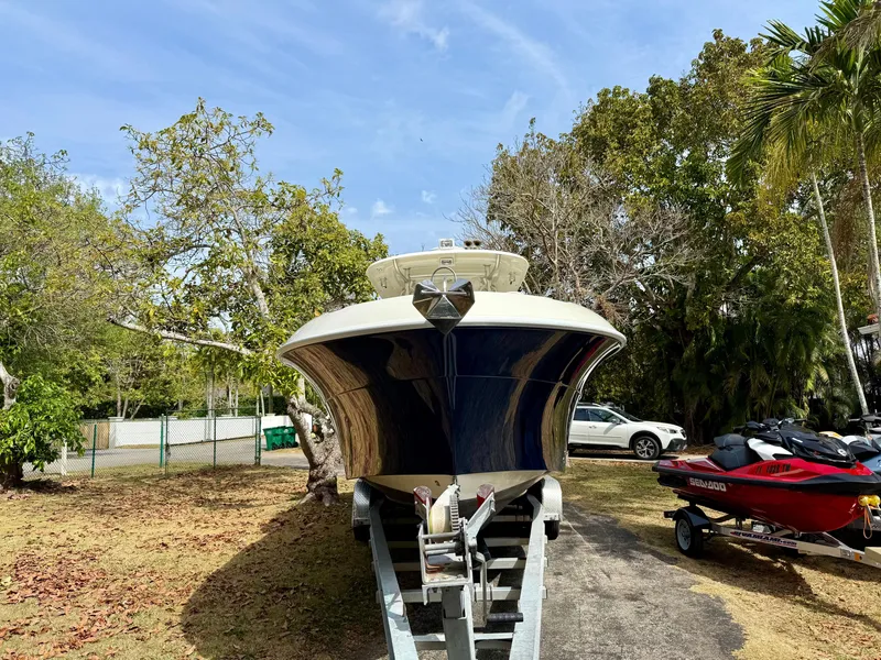 Slide: The Image of 2008 Hydra-Sports Vector 2900 CC boat on trailer, surrounded by trees. - 3