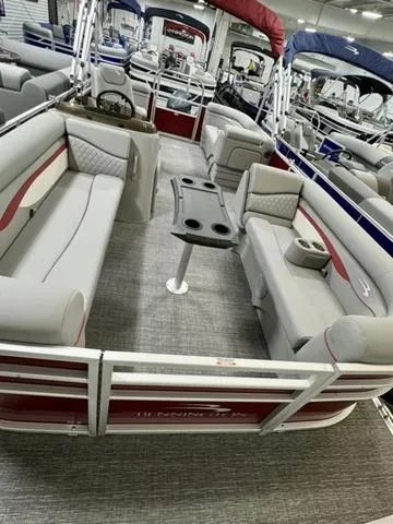 Slide: The Image of 2024 Bennington 20 SSR pontoon boat with spacious seating and center table. - 4